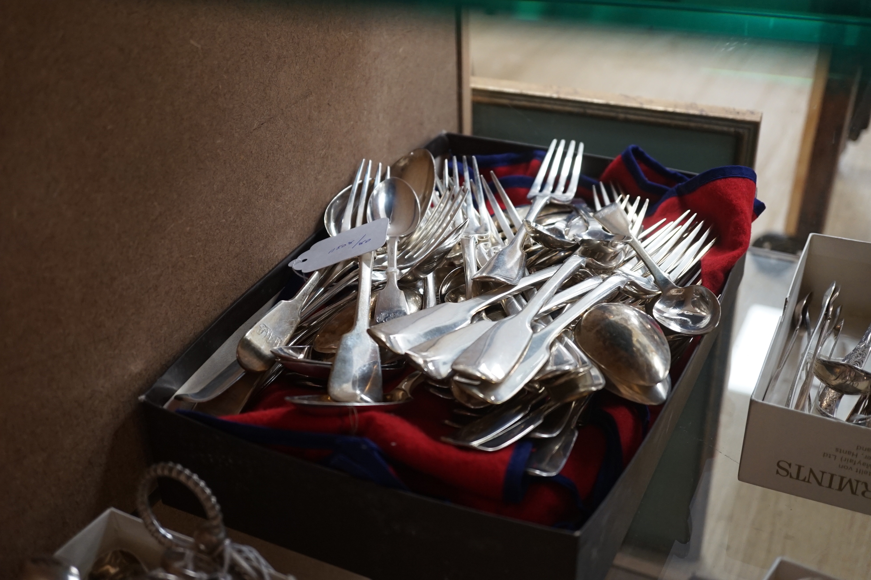 A harlequin canteen of 19th century silver fiddle pattern flatware, comprising fifty eight items, various dates and makers